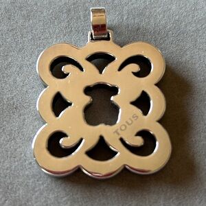 Authentic Tous pendant with a small bear in the center